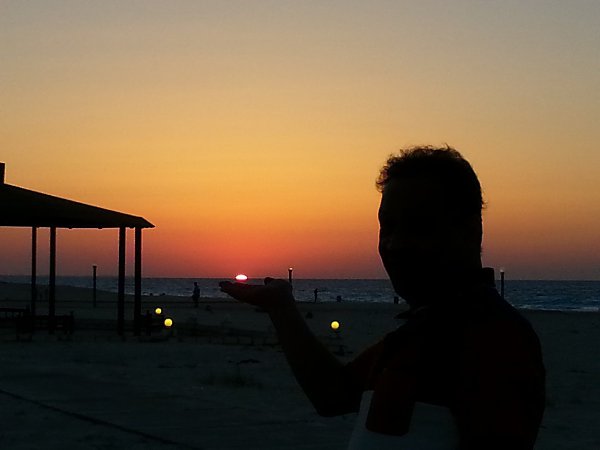 : The sun in my hand.... All are relatively - Hesham, 