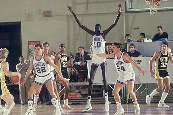   (Manute Bol)        