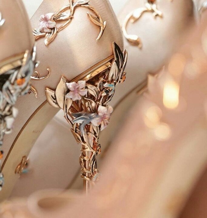      .   Ralph and Russo heels