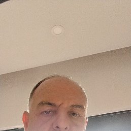 Tan, 49, 